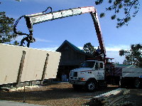 ROBERT UNLOADS SHEETROCK